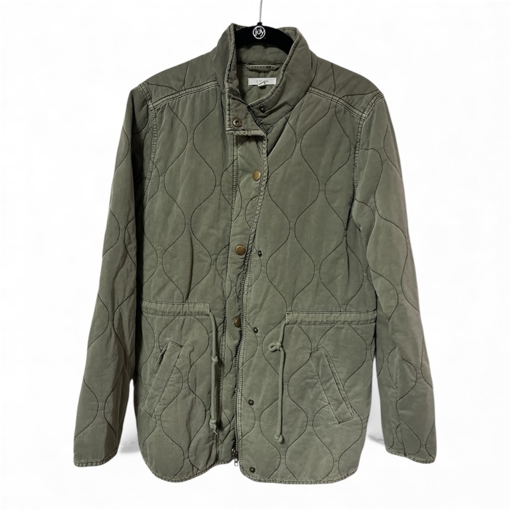 Maurice’s green coat